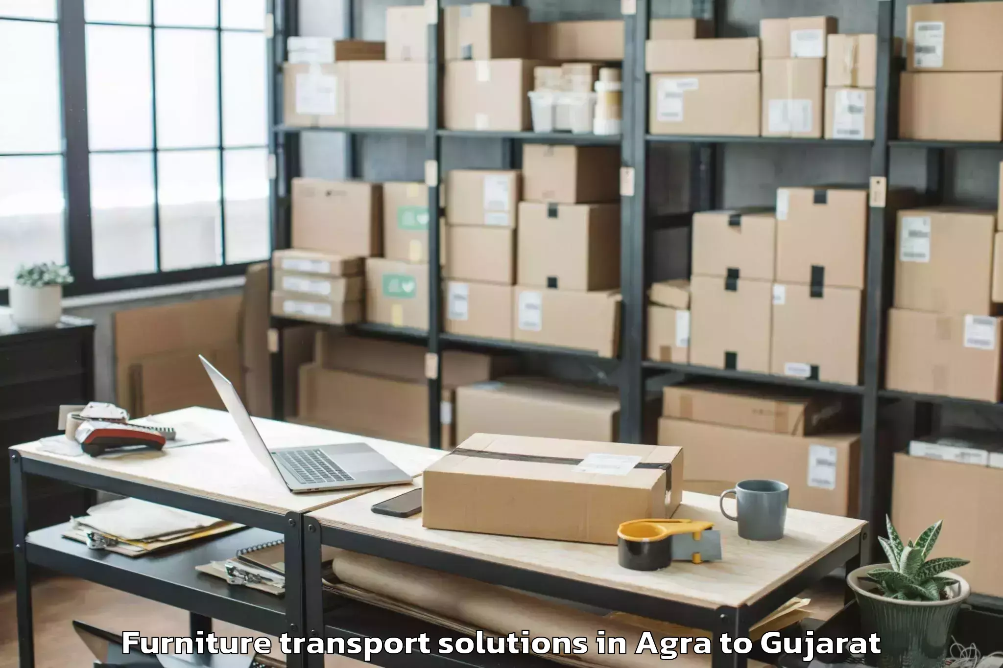 Trusted Agra to Kamrej Furniture Transport Solutions